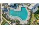 Overhead view of resort-style pool with surrounding lounge chairs and landscaping at 17744 Savory Mist Cir, Bradenton, FL 34211