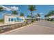 Sweetwater at Lakewood Ranch community entrance showcasing manicured landscaping and guardhouse at 17744 Savory Mist Cir, Bradenton, FL 34211