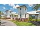 Charming exterior of a modern home with well-maintained landscaping and a paver driveway at 17744 Savory Mist Cir, Bradenton, FL 34211