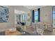 Bright lounge area with comfortable seating, stylish decor, and an open floor plan at 17744 Savory Mist Cir, Bradenton, FL 34211