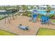 Community playground with slides, swings, and climbing structures, perfect for ' playtime at 17744 Savory Mist Cir, Bradenton, FL 34211