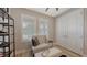 Sitting room with stylish decor, neutral colors, and lots of natural light at 17744 Savory Mist Cir, Bradenton, FL 34211