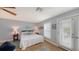 Inviting bedroom with a comfortable full sized bed, ceiling fan, and decorative pillows at 1775 Stapleton St, Sarasota, FL 34239