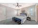 Calm bedroom with a comfortable bed, neutral tones, and a ceiling fan at 1775 Stapleton St, Sarasota, FL 34239