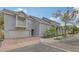 Beautiful gray home with manicured landscaping, a two-car garage, and charming curb appeal at 1775 Stapleton St, Sarasota, FL 34239