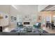 Spacious living room with a modern fireplace, vaulted ceiling, and stylish decor at 1775 Stapleton St, Sarasota, FL 34239