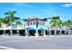 Commercial buildings with tropical landscaping, and pedestrian-friendly walkways at 1775 Stapleton St, Sarasota, FL 34239