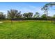 Community dog park with fenced area and grassy lawn at 206 Beacon Harbour Loop, Bradenton, FL 34212