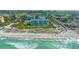 Aerial view shows private beach, ocean view, and community pool and amenities at 2105 Gulf Of Mexico Dr # 3303, Longboat Key, FL 34228