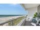 This home features a balcony with stunning views of the white sand beach and ocean at 2105 Gulf Of Mexico Dr # 3303, Longboat Key, FL 34228