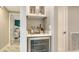 This features a beverage cooler, cabinet storage and a marble countertop at 2105 Gulf Of Mexico Dr # 3303, Longboat Key, FL 34228