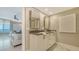 Elegant bathroom with double vanity and modern lighting at 2105 Gulf Of Mexico Dr # 3303, Longboat Key, FL 34228