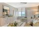Serene bedroom boasts ocean views and stylish decor at 2105 Gulf Of Mexico Dr # 3303, Longboat Key, FL 34228