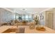 This spacious kitchen with bar seating, stainless steel sink, and a view to the open living space at 2105 Gulf Of Mexico Dr # 3303, Longboat Key, FL 34228