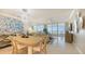 Bright living room with ocean view, white marble floors, and stylish decor at 2105 Gulf Of Mexico Dr # 3303, Longboat Key, FL 34228