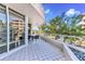 Spacious balcony with patio furniture and stunning water views at 3070 Grand Bay Blvd # 612, Longboat Key, FL 34228