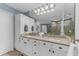 Bathroom boasts double sinks, granite countertop, and ample storage at 3070 Grand Bay Blvd # 612, Longboat Key, FL 34228