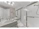 Bright bathroom with walk-in shower, toilet, and single vanity at 3070 Grand Bay Blvd # 612, Longboat Key, FL 34228