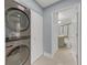 Convenient laundry room with stackable washer and dryer at 3070 Grand Bay Blvd # 612, Longboat Key, FL 34228