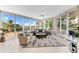 Spacious living room with large windows and water views at 3070 Grand Bay Blvd # 612, Longboat Key, FL 34228