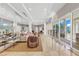 Elegant condo lobby featuring a stylish seating area and large windows at 3070 Grand Bay Blvd # 612, Longboat Key, FL 34228