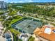 Well-maintained tennis courts surrounded by lush landscaping at 3070 Grand Bay Blvd # 612, Longboat Key, FL 34228