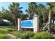Longboat Key welcome sign with lush tropical landscaping at 3070 Grand Bay Blvd # 612, Longboat Key, FL 34228