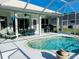 Relaxing screened pool and patio area, perfect for outdoor entertaining at 3522 Little Country Rd, Parrish, FL 34219