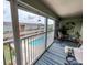 Relaxing balcony overlooking the community pool at 3755 S School Ave # 44, Sarasota, FL 34239