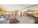 Living room with multiple seating areas and ocean view at 3806 Gulf Of Mexico Dr # C-312, Longboat Key, FL 34228