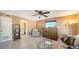 Living room features tile floors, a ceiling fan, and comfortable seating at 3806 Gulf Of Mexico Dr # C-312, Longboat Key, FL 34228
