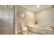 Bright bathroom offers a shower and garden tub at 4409 Eleuthera Ct, Sarasota, FL 34233