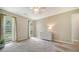 Bright bedroom with neutral decor, carpeted floor, and natural light at 4409 Eleuthera Ct, Sarasota, FL 34233