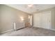 Inviting bedroom includes plush carpeting and neutral walls at 4409 Eleuthera Ct, Sarasota, FL 34233