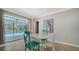 Dining room with a view of the pool area. Seats four at 4409 Eleuthera Ct, Sarasota, FL 34233