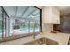 Kitchen sink and counter with a view of a screened-in pool area at 4409 Eleuthera Ct, Sarasota, FL 34233