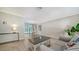 Spacious living room with access to the pool area and dining room at 4409 Eleuthera Ct, Sarasota, FL 34233