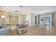Open-concept living area with access to the dining room and pool at 4409 Eleuthera Ct, Sarasota, FL 34233