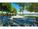 Community shuffleboard court with waterfront views at 4440 Exeter Dr # N304, Longboat Key, FL 34228