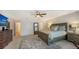 Spacious bedroom with large bed and dresser at 4557 Bay Club Dr, Bradenton, FL 34210