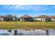 Aerial view of homes with screened lanais and water views at 4727 Motta Ct, Bradenton, FL 34211