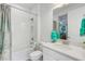 Clean bathroom with white vanity, bathtub, and shower at 4727 Motta Ct, Bradenton, FL 34211