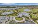 Community clubhouse with parking and golf course at 4727 Motta Ct, Bradenton, FL 34211