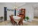 Bright dining room with hardwood floors and a wood dining table at 4727 Motta Ct, Bradenton, FL 34211