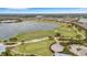 Golf course with lake and putting green at 4727 Motta Ct, Bradenton, FL 34211