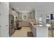 Modern kitchen with stainless steel appliances and light gray cabinets at 4727 Motta Ct, Bradenton, FL 34211