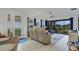 Open living area with sliding glass doors to the backyard and access to the kitchen at 4727 Motta Ct, Bradenton, FL 34211