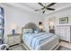Comfortable main bedroom with a king bed and ensuite bathroom access at 4727 Motta Ct, Bradenton, FL 34211