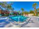 Community pool with ample space for lounging and relaxation at 504 Spring Lakes Blvd # 504, Bradenton, FL 34210