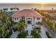 Luxury beachfront home with terracotta roof at 507 Casey Key Rd, Nokomis, FL 34275